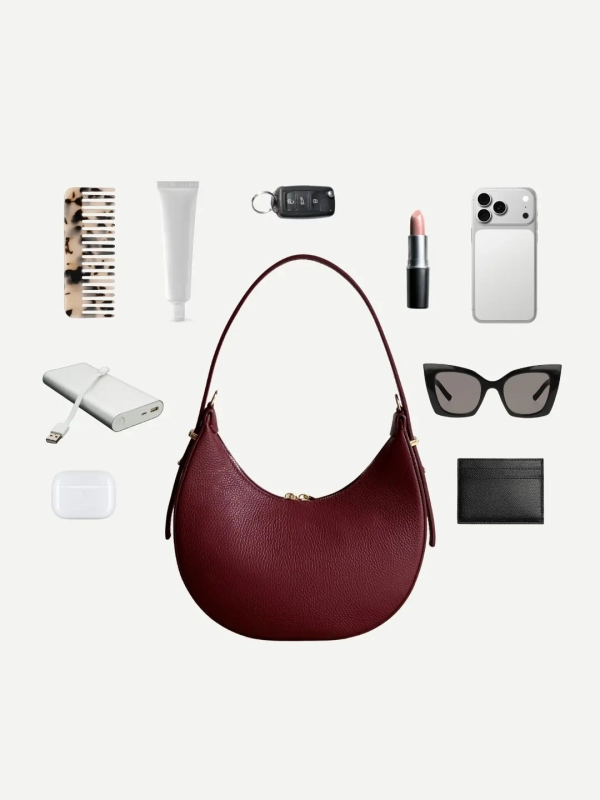 Torebka skórzana bordowa na ramię półksiężyc MOON Venasti minimalistyczna elegancka.webp