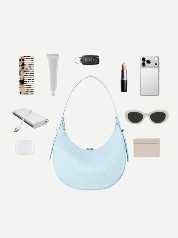 Torebka skórzana niebieska błękitna baby blue sky blue na ramię półksiężyc MOON Venasti minimalistyczna elegancka.webp