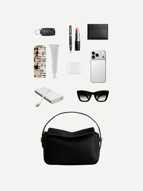 Torebka skórzana czarna minimalistyczna na szerokim pasku crossbody Nuvola Venasti.webp